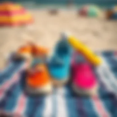 Colorful slip-on shoes arranged on a beach towel