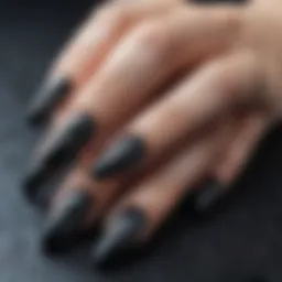 Elegant black long press on nails with intricate designs