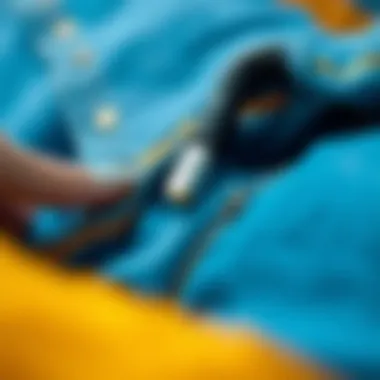 Close-up of a magnet remover in action on clothing