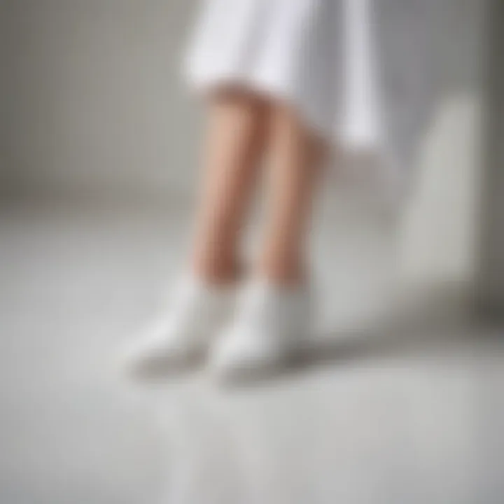 Stylish all white nursing shoes on a polished floor