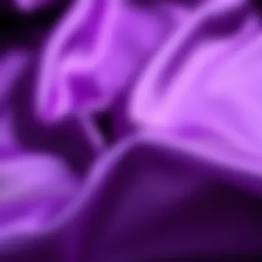 Close-up of the soft texture of purple satin fabric