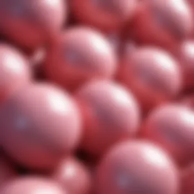 Close-up view of various pink decorative balls showcasing different textures and materials