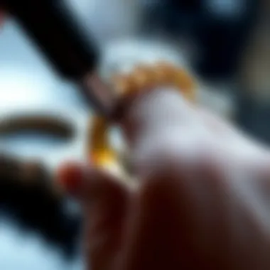 Close-up of a gold ring being polished