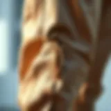 A close-up view of side split hem pants showcasing intricate fabric details.