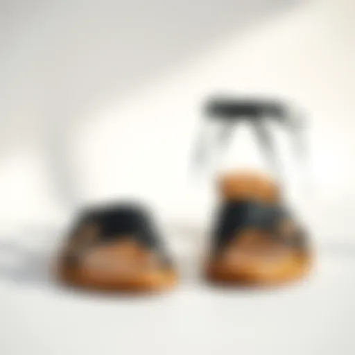 Elegant black summer flat sandals on a minimalist background